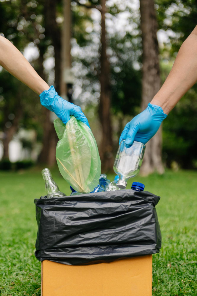 people-hand-holding-garbage-bottle-plastic-glass-putting-into-recycle-bag-clearing-pollution-ecology-plastic-conceptxa